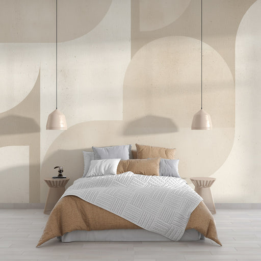 Une chambre moderne avec un papier peint aux formes géométriques douces dans des teintes beige et crème, créant une atmosphère apaisante et élégante.