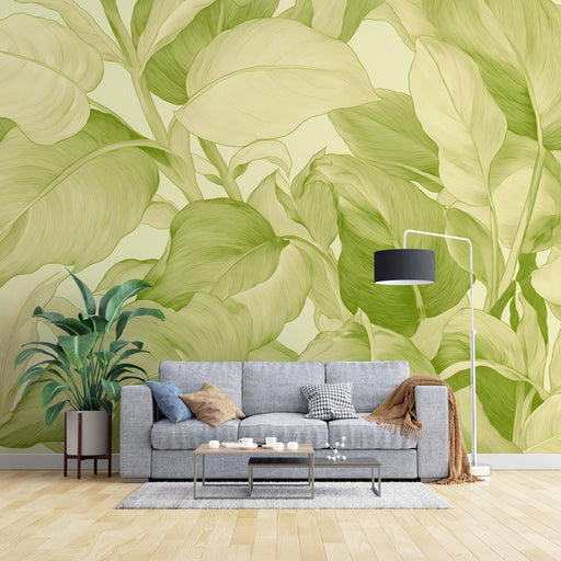 Un salon moderne avec un papier peint représentant de grandes feuilles vertes sur un fond clair, créant une ambiance fraîche et apaisante.