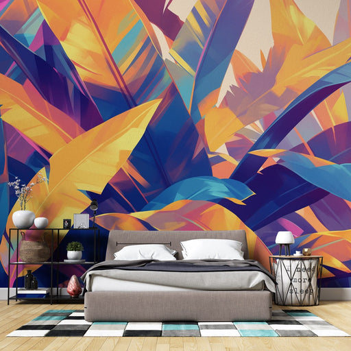 Une chambre moderne avec un papier peint tropical aux grandes feuilles colorées dans des teintes vives de bleu, jaune et violet, créant une ambiance dynamique et énergisante.