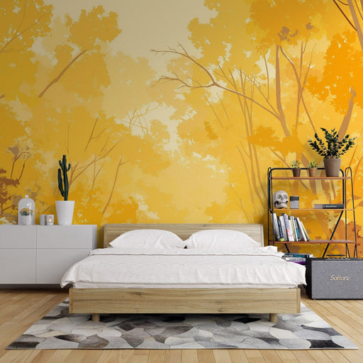 Une chambre lumineuse avec un papier peint aux teintes jaunes représentant des arbres en automne, créant une atmosphère chaleureuse et apaisante.