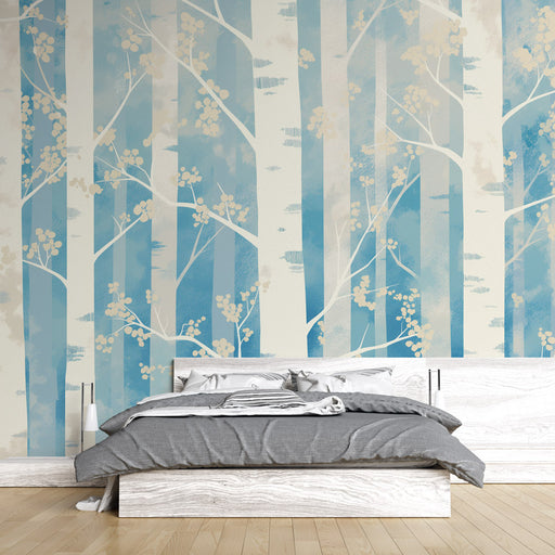 Une chambre apaisante avec un papier peint représentant des troncs d'arbres stylisés en bleu et blanc, évoquant une ambiance naturelle et sereine.