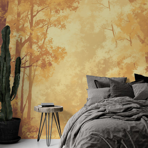 Une chambre chaleureuse avec un papier peint aux teintes dorées et orangées représentant des silhouettes d'arbres, créant une ambiance apaisante et naturelle.