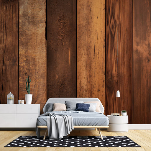 Une chambre moderne avec un papier peint imitant des panneaux de bois aux teintes chaudes et variées, créant une atmosphère chaleureuse et accueillante.