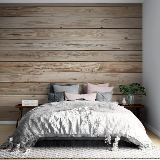 Une chambre moderne avec un papier peint imitant des planches de bois clair, créant une atmosphère chaleureuse et naturelle.