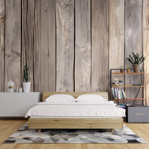 Une chambre moderne avec un papier peint imitant des planches de bois naturel, créant une atmosphère chaleureuse et authentique.