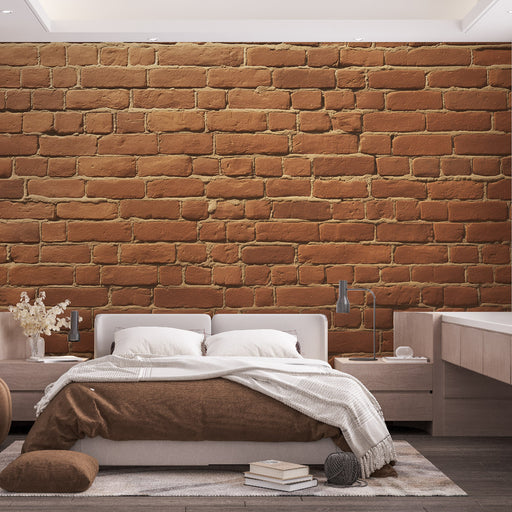 Une chambre moderne avec un papier peint imitant un mur en briques rouges, apportant une ambiance chaleureuse et industrielle à l'espace.