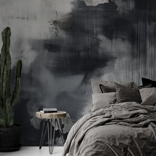 Une chambre moderne avec un papier peint abstrait aux nuances de noir et gris, créant une atmosphère élégante et apaisante.
