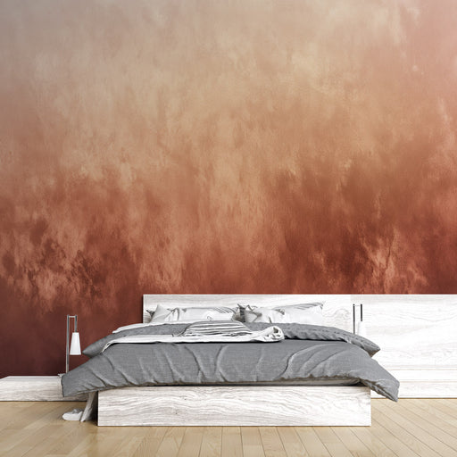 Une chambre moderne avec un papier peint dégradé aux nuances chaudes de beige et terracotta, créant une atmosphère accueillante et apaisante.