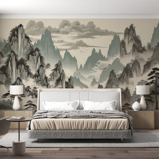 Une chambre apaisante avec un papier peint représentant des montagnes chinoises en nuances de gris et vert, créant une atmosphère zen et contemplative.