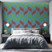 Papier peint coloré avec motifs de feuilles rouges, vertes et bleues pour chambre moderne.