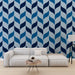 Papier peint bleu avec motif de feuilles géométriques pour salon moderne