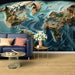 Papier peint carte du monde en relief avec continents colorés pour salon moderne