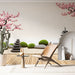 Papier peint zen avec paysage japonais, cerisiers en fleurs et pierres pour salon apaisant.