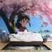 Papier peint mural avec motif de cerisier en fleurs et personnage animé pour chambre à coucher moderne.