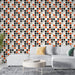 Papier peint moderne avec motifs de points noirs et orange pour salon contemporain