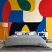 Papier peint abstrait coloré avec motifs géométriques vibrants en couleurs primaires pour chambre moderne