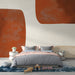 Papier peint abstrait avec formes organiques aux teintes chaudes pour chambre moderne