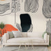 Papier peint abstrait avec motifs organiques en noir et couleurs terre pour salon moderne.