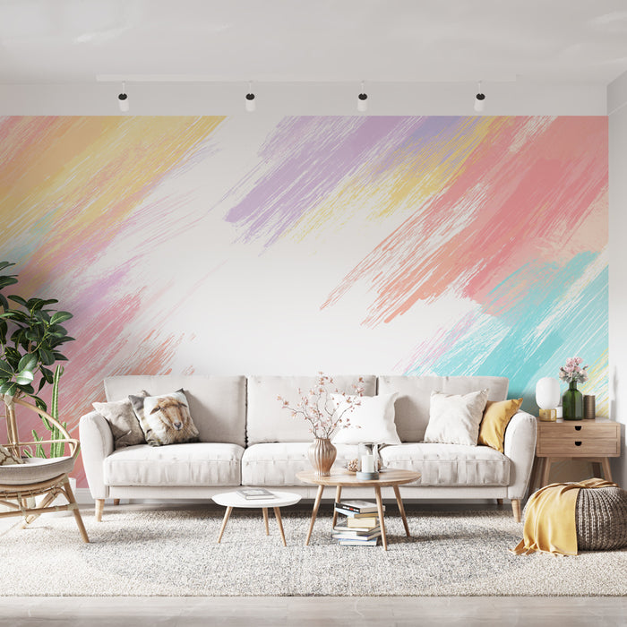 Un salon lumineux avec un papier peint abstrait aux teintes pastel de rose, violet et jaune, créant une atmosphère douce et artistique.