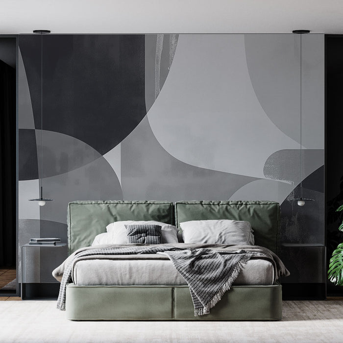 Une chambre moderne avec un papier peint abstrait en nuances de gris et de noir, créant une atmosphère élégante et contemporaine.