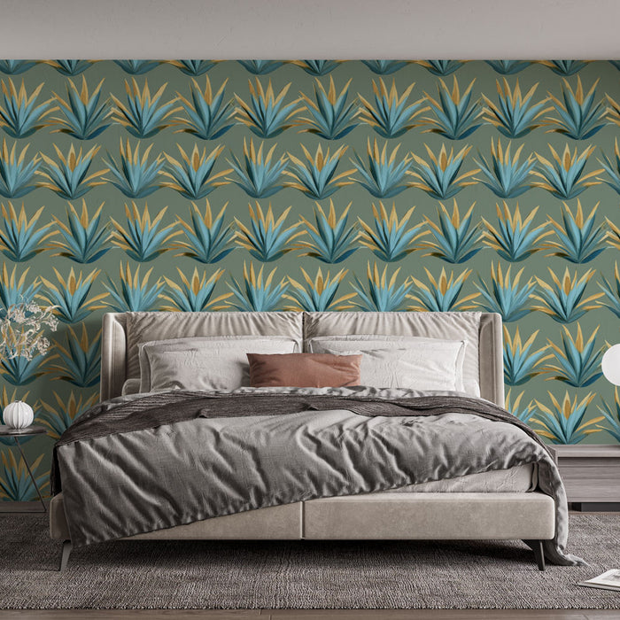 Une chambre moderne avec un papier peint tropical aux motifs de grandes feuilles d'agave bleu et doré sur fond vert, créant une ambiance vivifiante et apaisante.