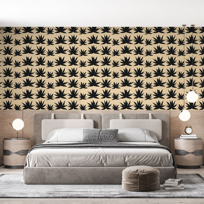 Une chambre moderne avec un papier peint beige orné de motifs de feuilles noires, créant une ambiance à la fois élégante et naturelle.