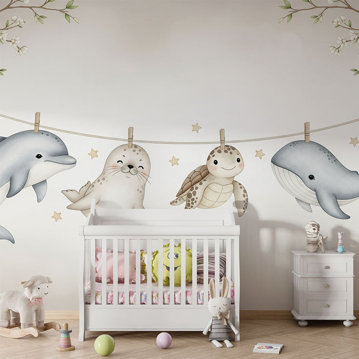 Une chambre d'enfant avec un papier peint illustrant des animaux marins adorables suspendus, créant une atmosphère ludique et douce.