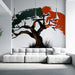 Un salon moderne avec un papier peint artistique représentant un arbre stylisé en noir, agrémenté de touches de vert et d'orange, créant une ambiance dynamique et contemporaine.