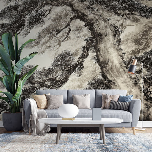 Un salon contemporain avec un papier peint représentant un arbre stylisé en noir et blanc, créant une atmosphère artistique et apaisante.