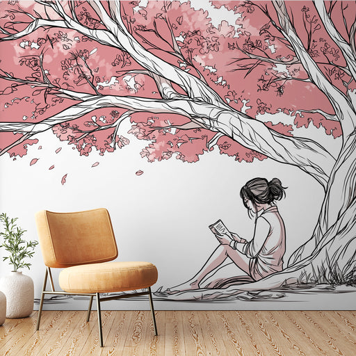 Une chambre moderne avec un papier peint illustratif représentant une jeune femme lisant sous un arbre aux feuilles roses, créant une ambiance douce et rêveuse.
