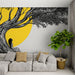 Une salle de séjour moderne avec un papier peint artistique représentant un arbre noir stylisé et une silhouette contemplative sur fond jaune, créant une ambiance sereine et inspirante.