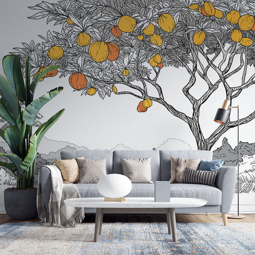 Un salon moderne avec un papier peint illustrant un arbre fruitier aux oranges et jaunes, créant une ambiance fraîche et naturelle.