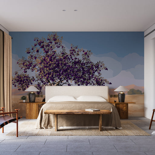 Une chambre moderne avec un papier peint représentant un grand arbre fleuri aux teintes violettes sur fond de ciel bleu, créant une atmosphère apaisante et naturelle.