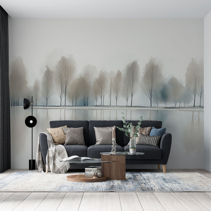 Un salon élégant avec un papier peint représentant une rangée d'arbres délicats dans des teintes douces de gris et de bleu, créant une atmosphère apaisante et naturelle.