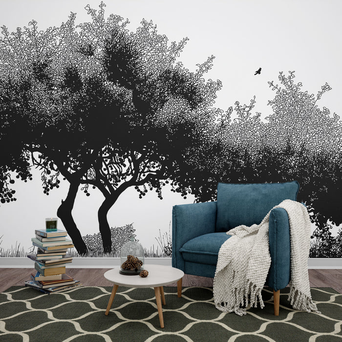 Une pièce de salon avec un papier peint noir représentant des arbres stylisés aux motifs délicats, créant une atmosphère artistique et apaisante.