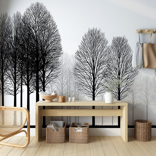 Une pièce moderne avec un papier peint représentant des arbres en silhouettes noires sur fond clair, créant une ambiance élégante et apaisante.
