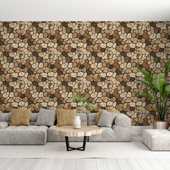 Un salon moderne avec un papier peint aux motifs de pierres naturelles dans des teintes marron, beige et noir, créant une ambiance chaleureuse et organique.