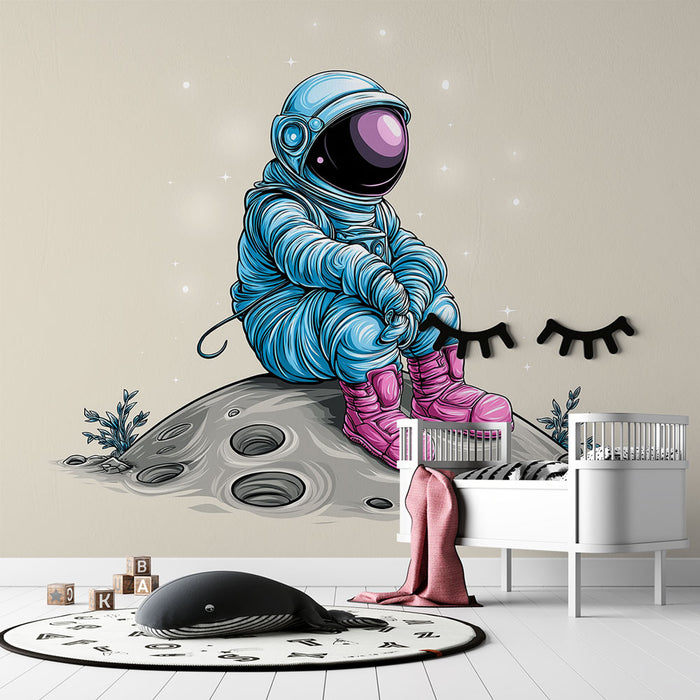 Une chambre d'enfant avec un papier peint illustrant un astronaute bleu assis sur une lune, dégageant une ambiance ludique et imaginative.