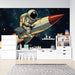 Papier peint espace enfant avec astronaute sur fusée colorée pour chambre ludique