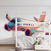 Papier peint avion coloré avec illustration ludique pour chambre d'enfant.