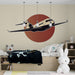 Papier peint avion vintage avec avion stylisé sur fond circulaire rouge pour chambre d'enfant.