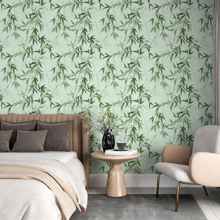 Une chambre moderne avec un papier peint représentant des feuilles de bambou vertes sur fond vert clair, créant une atmosphère apaisante et naturelle.