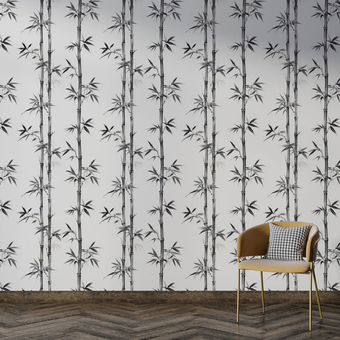 Un salon contemporain avec un papier peint représentant des tiges de bambou en noir et blanc, créant une ambiance zen et élégante.