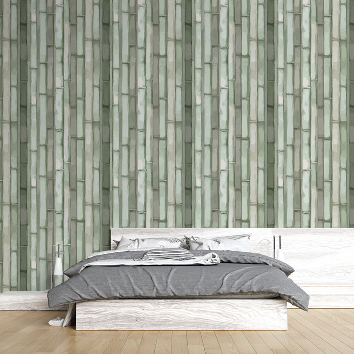 Une chambre moderne avec un papier peint imitant des tiges de bambou dans des nuances de vert, créant une atmosphère apaisante et naturelle.