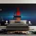Papier peint bateau voilier aux voiles rouges sur une mer tranquille pour chambre moderne