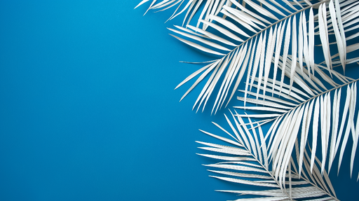 Papier peint bleu canard Feuilles de palmier blanches sur fond bleu