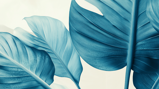 Papier peint bleu canard Grosses feuilles tropicales et nuances de bleu