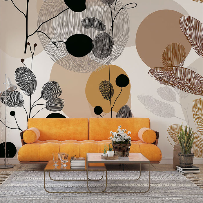 Un salon moderne avec un papier peint abstrait aux motifs floraux et géométriques en noir, beige et ocre créant une atmosphère chaleureuse et artistique.
