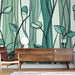 Une pièce moderne avec un papier peint aux motifs de feuilles stylisées dans des teintes vertes sur fond clair, créant une ambiance apaisante et naturelle.