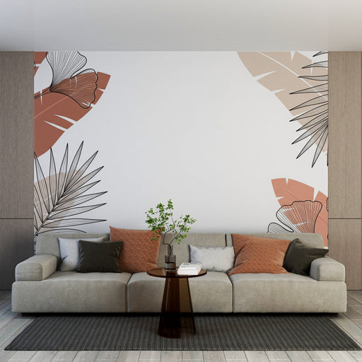 Un salon moderne avec un papier peint tropical aux motifs de grandes feuilles stylisées dans des teintes terracotta et beige, créant une ambiance chaleureuse et accueillante.